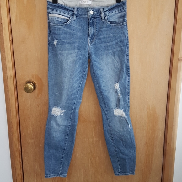 Medium wash jean with light distressing. - Picture 1 of 5